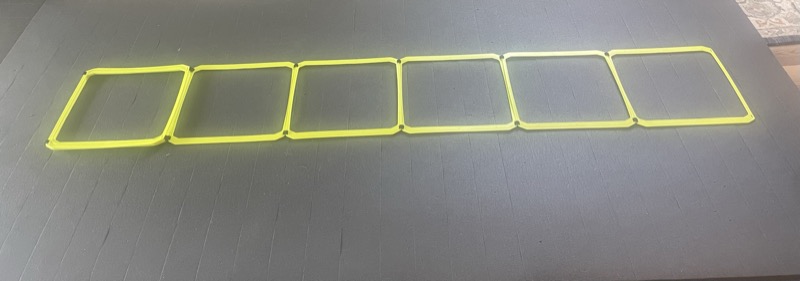 The Ladder Mat — premium training surface with painted agility ladder